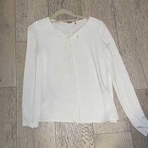 White top-body is blouse fabric-sleeves are cotton